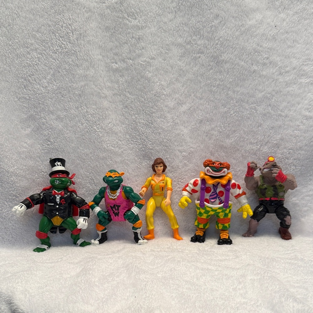 Vintage Teenage Mutant Ninja Turtles action figures from the 1990s